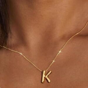 BRAND NEW, STILL IN THE PACKAGE Trendy Bubble Initial Charm and Necklace, “K”.